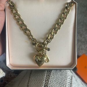 Great gold juicy couture starter charm necklace slight tarnish on one side